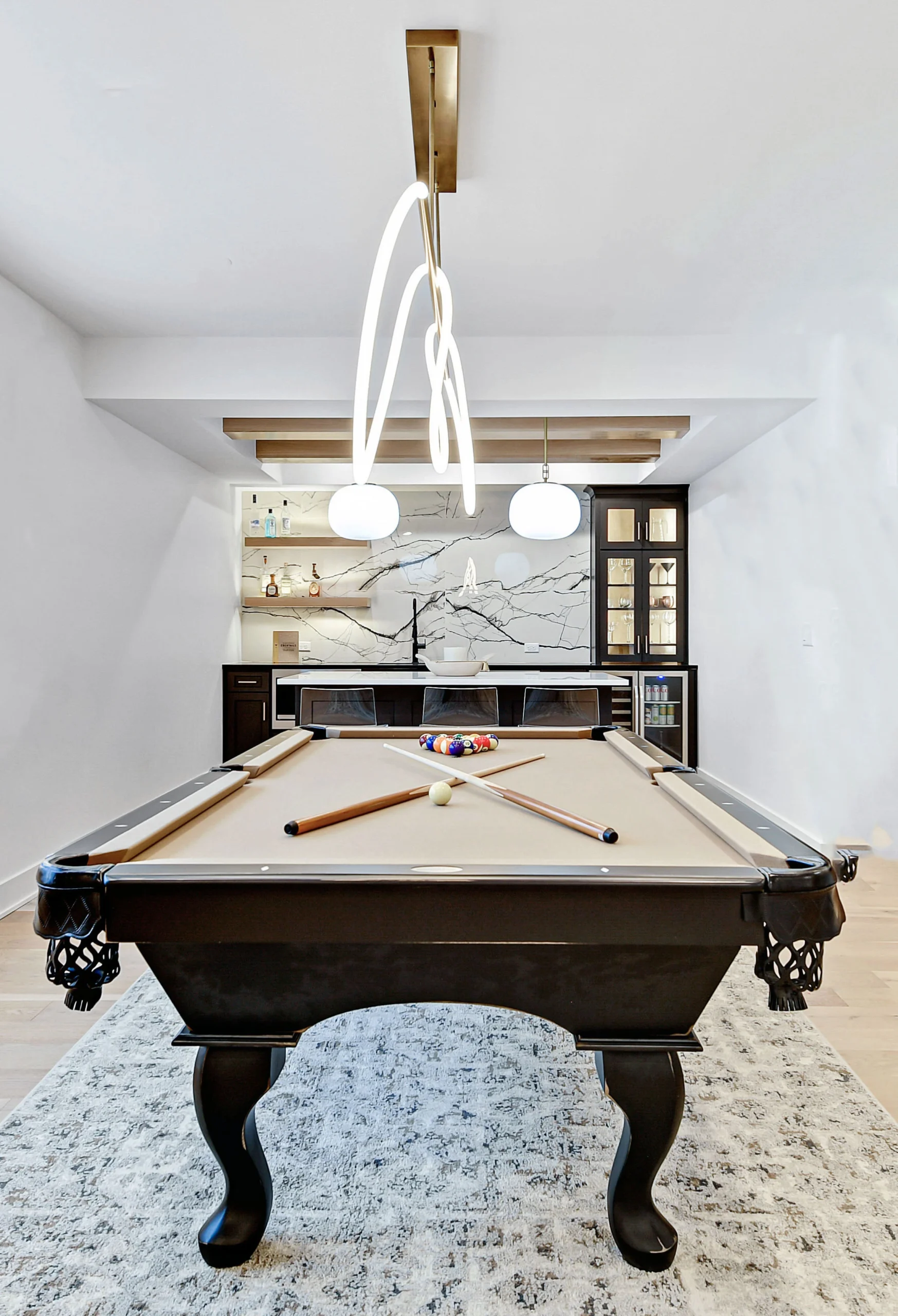 Basement finishing detail with custom cabinetry and tile work