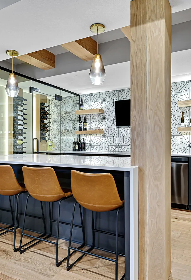 Finished basement remodel in Overland Park KS with modern flooring, recessed lighting, and open living space