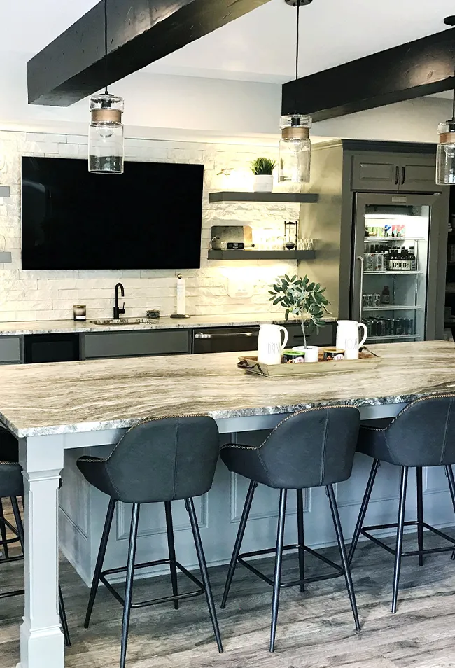 Custom basement finishing project in Overland Park KS with entertainment area and upgraded lighting